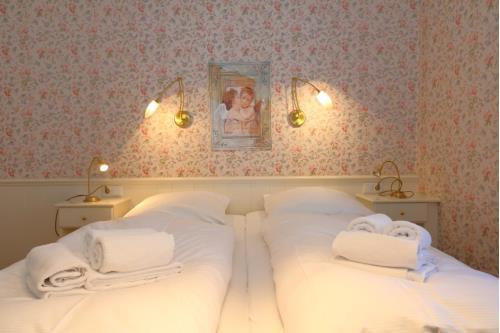 Sylt Haus Krauthahn - Ferienwohnung EG Kamin - Innenansicht